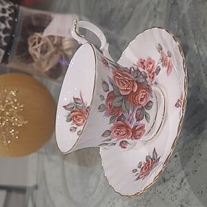 CENTENIAL ROSE ROYAL ALBERT SAUCER AND CUP